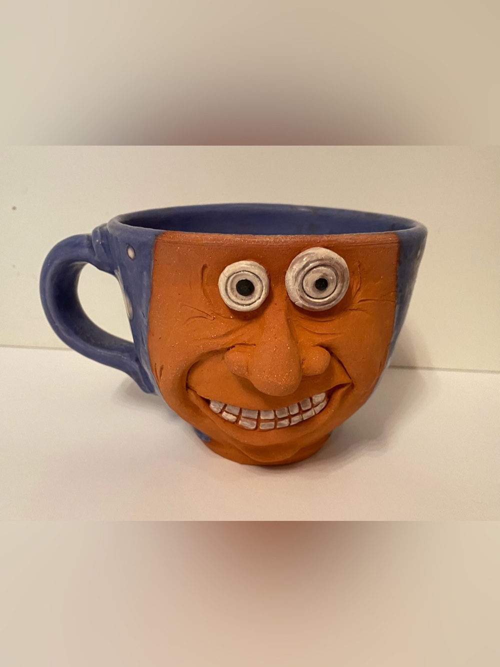 HANDMADE CRAFTED MUG POTTERY FUNNY FACE BLUE BROWN EYES NOSE TEETH J. COTTON